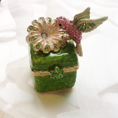 Hummingbird On a Box